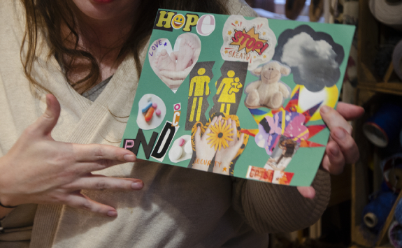 Participant describing her motherhood collage